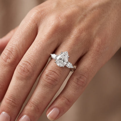 Grace Three Stone Pear Diamond Engagement Ring in White Gold - lifestyle.jpg