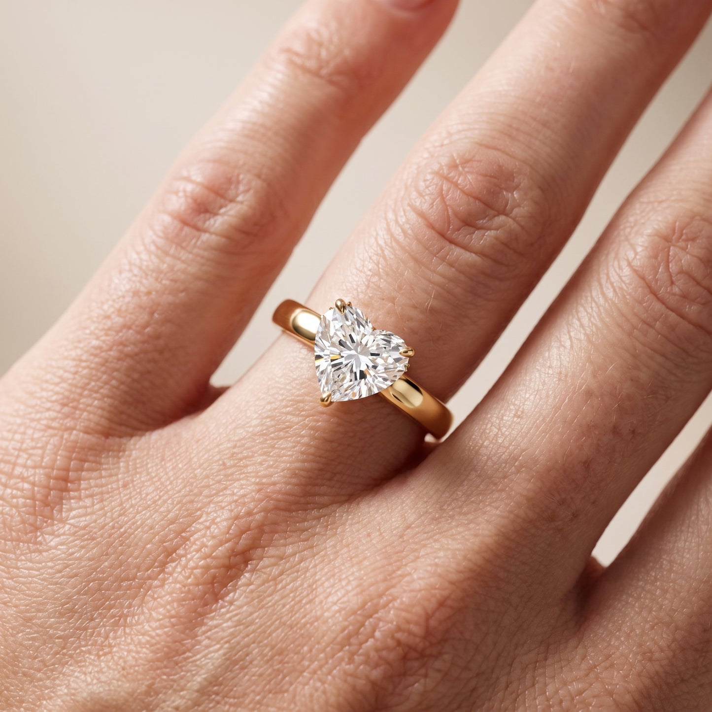 Lara Hidden Halo Heart Diamond Engagement Ring in Yellow Gold - lifestyle.jpg