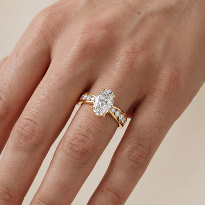 Noor Channel Set Sidestone Oval Diamond Engagement Ring in Yellow Gold - lifestyle.jpg