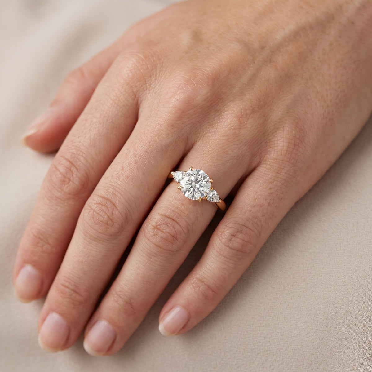 Libby Pear-Side Three-Stone Round Diamond Engagement Ring in Silver - lifestyle.jpg