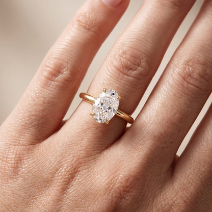Amaya Hidden Halo Oval Diamond Ring in Yellow Gold - lifestyle.jpg