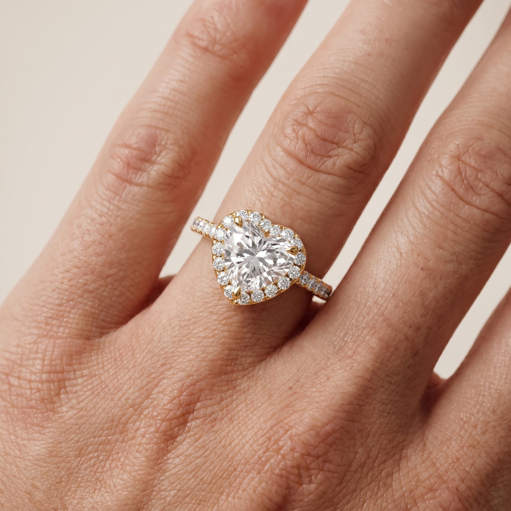 Amara Halo Claw Prong Heart Diamond Ring in Yellow Gold - lifestyle.jpg