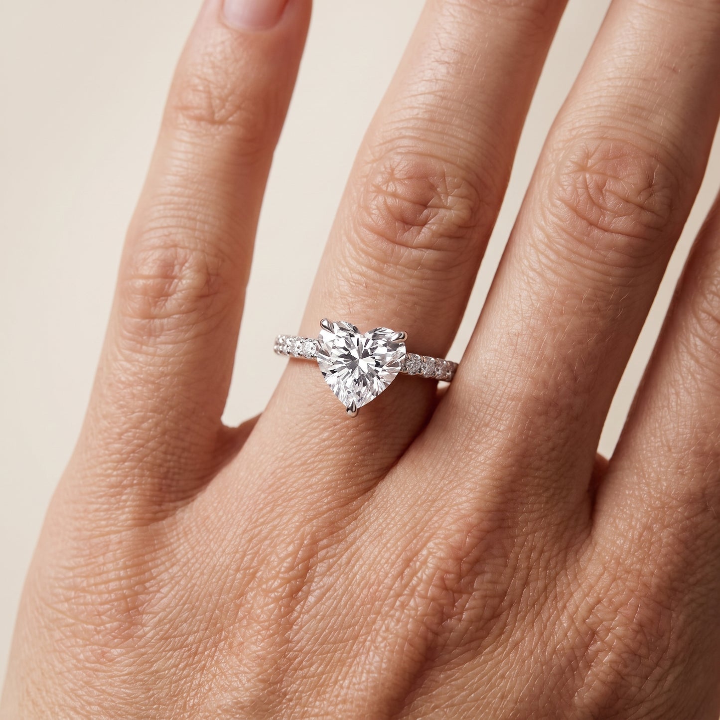 Maya Hidden Halo Pavé Heart Diamond Engagement Ring in Platinum - lifestyle.jpg