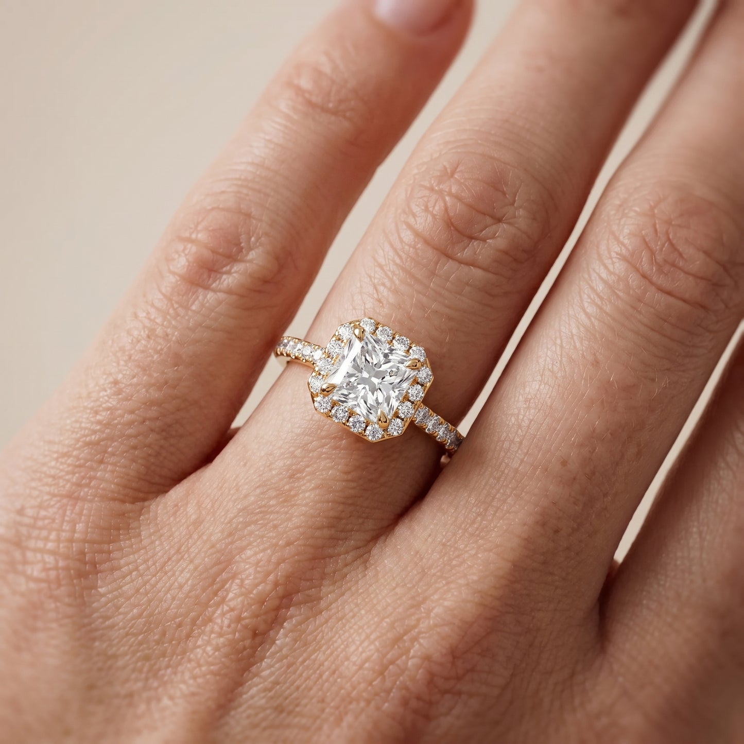 Amara Halo Claw Prong Radiant Diamond Ring in Yellow Gold - lifestyle.jpg