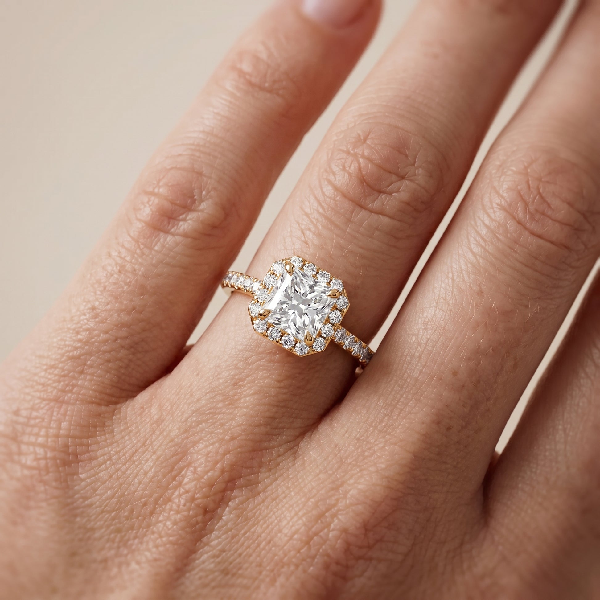 Amara Halo Claw Prong Radiant Diamond Ring in Yellow Gold - lifestyle.jpg