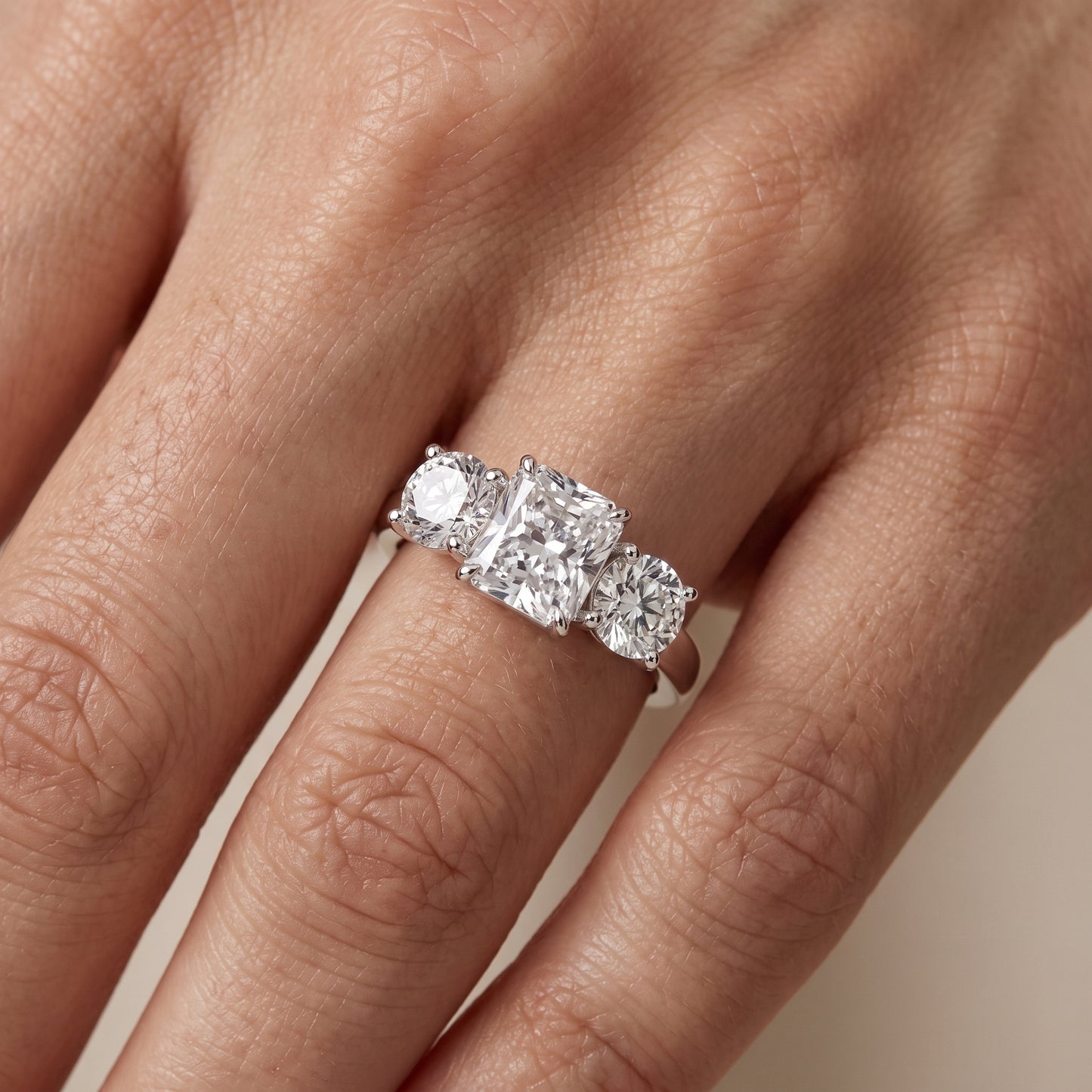 Esme Three-Stone Tapered Radiant Diamond Ring in Platinum - lifestyle.jpg