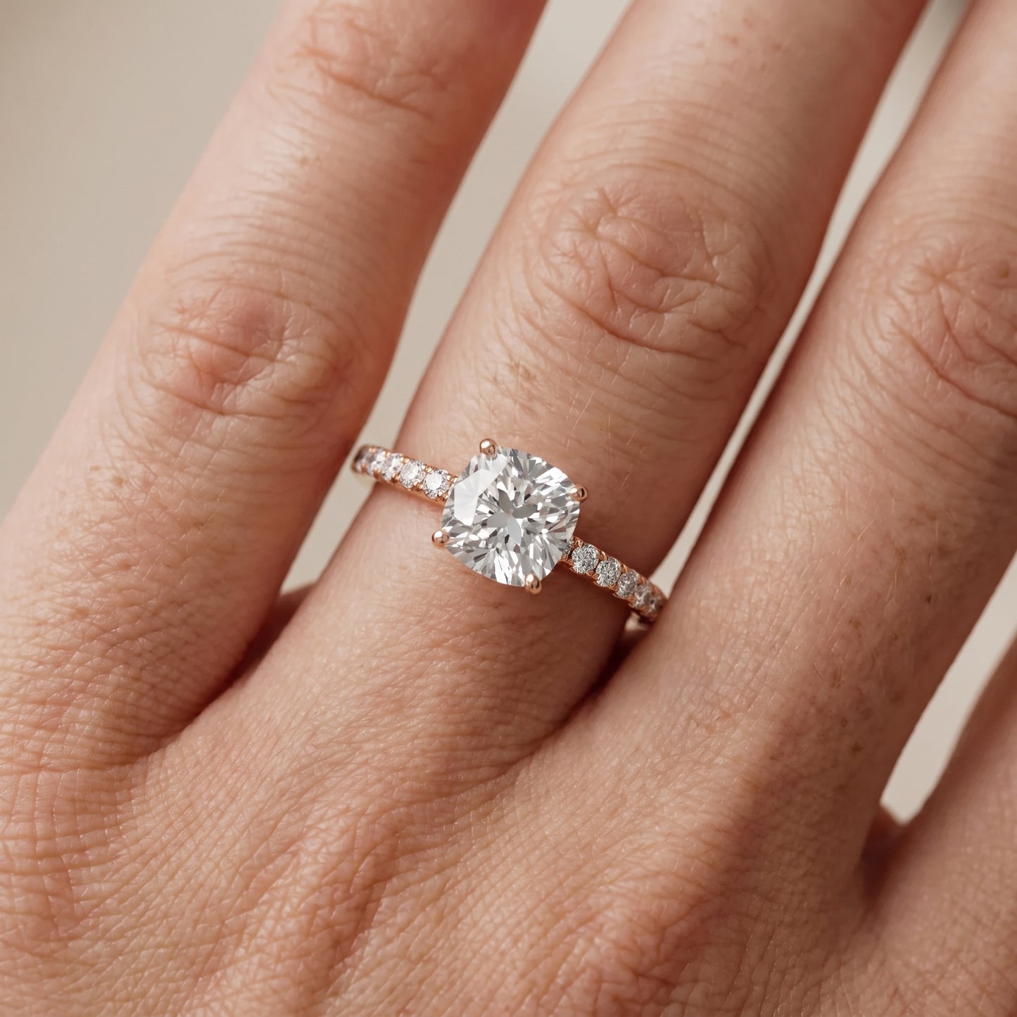 Juna French Pavé Solitaire Cushion Diamond Engagement Ring in Rose Gold - lifestyle.jpg