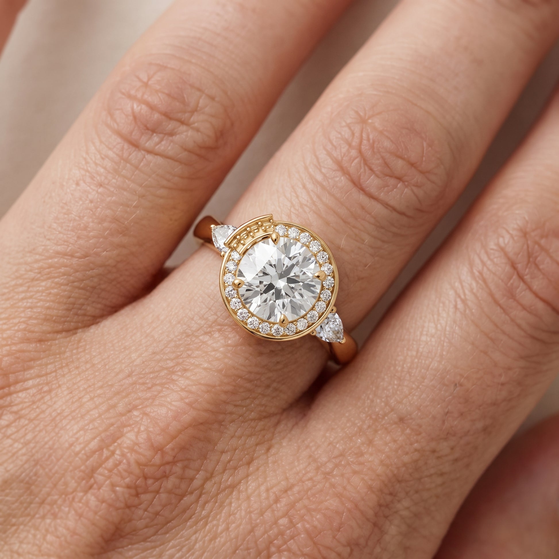 Eliza Halo Sidestone Round Diamond Engagement Ring in Yellow Gold - lifestyle.jpg