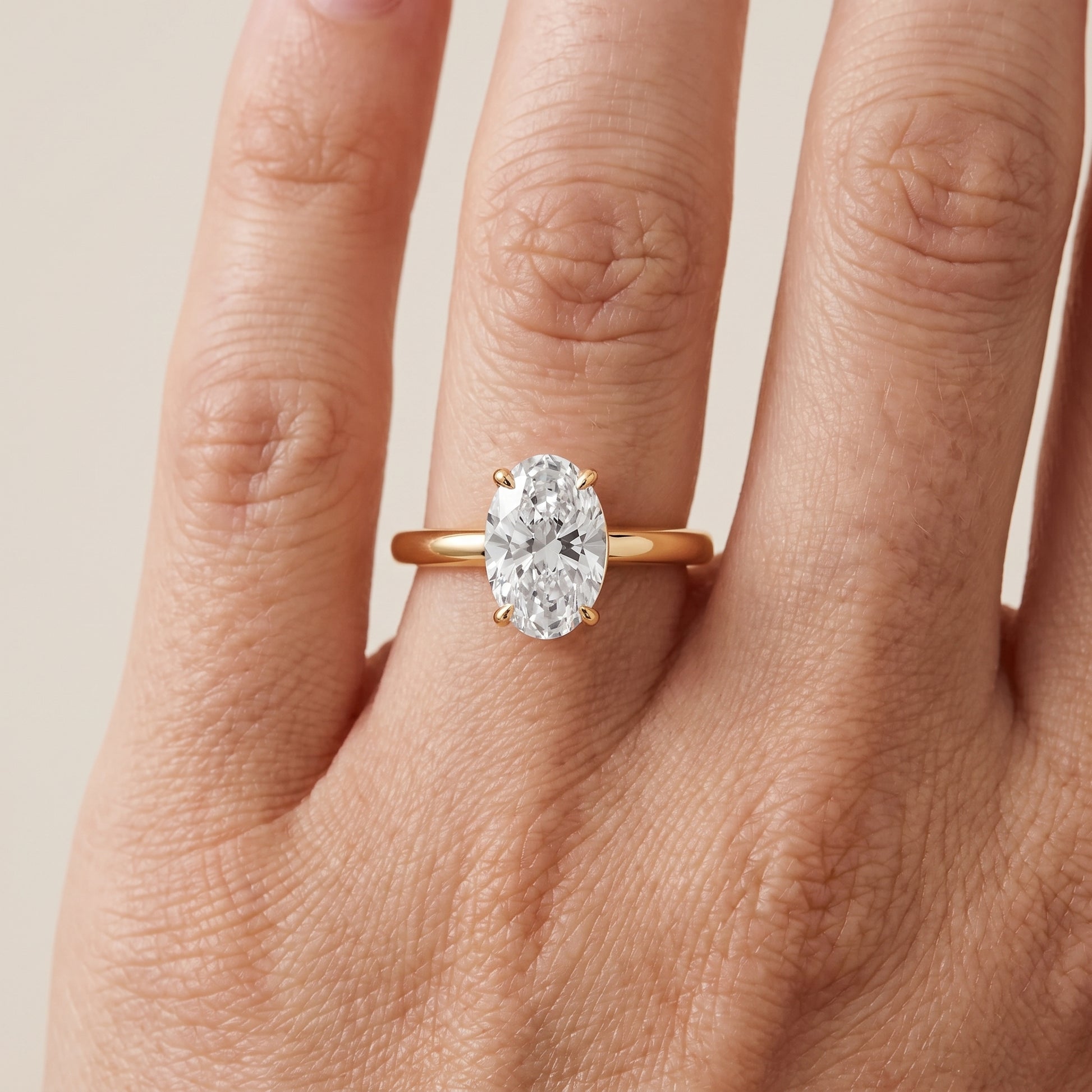 Sadie Cathedral Solitaire Oval Diamond Ring in Yellow Gold - lifestyle.jpg