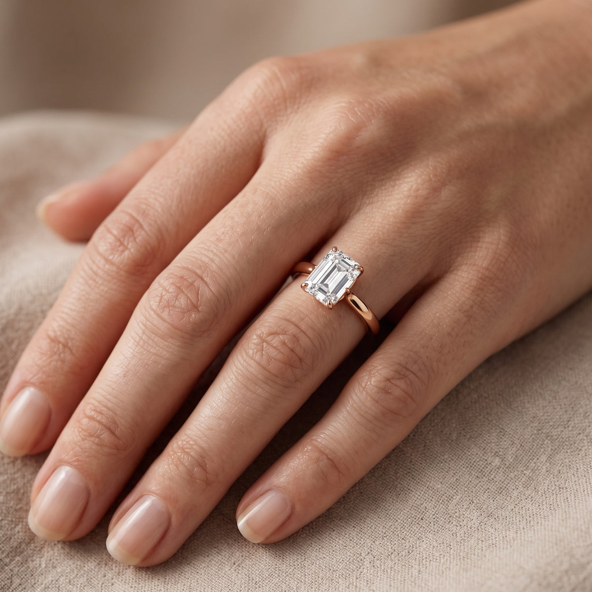 Serena Blossom Solitaire Emerald Diamond Engagement Ring in Rose Gold - lifestyle.jpg