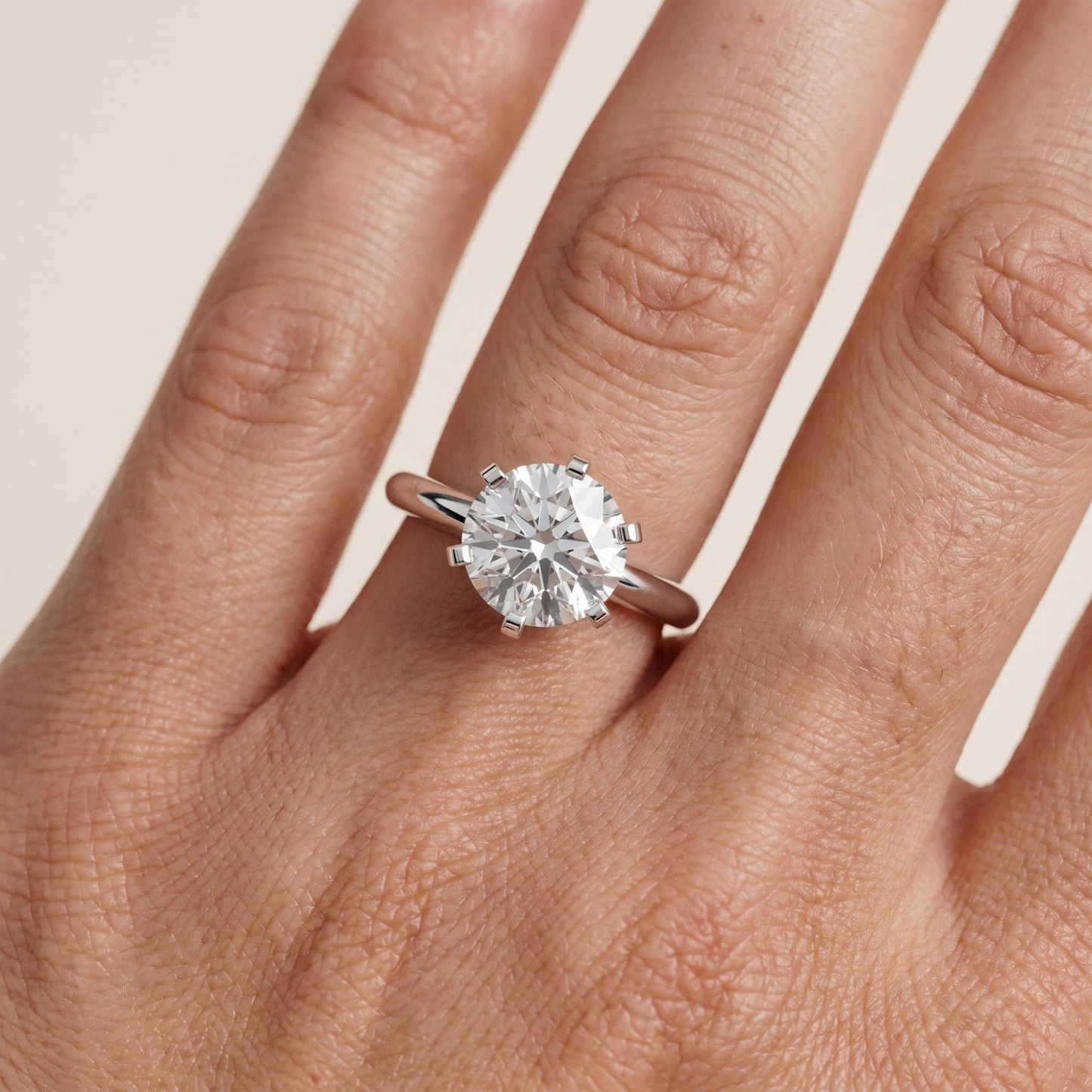 Amira Six-Prong Solitaire Round Diamond Engagement Ring in Platinum - lifestyle.jpg