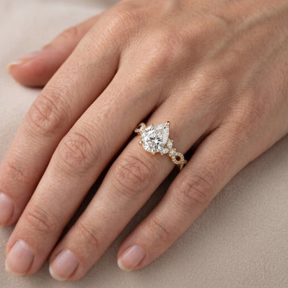 Neva Infinity Twist Pear Diamond Engagement Ring in Yellow Gold - lifestyle.jpg