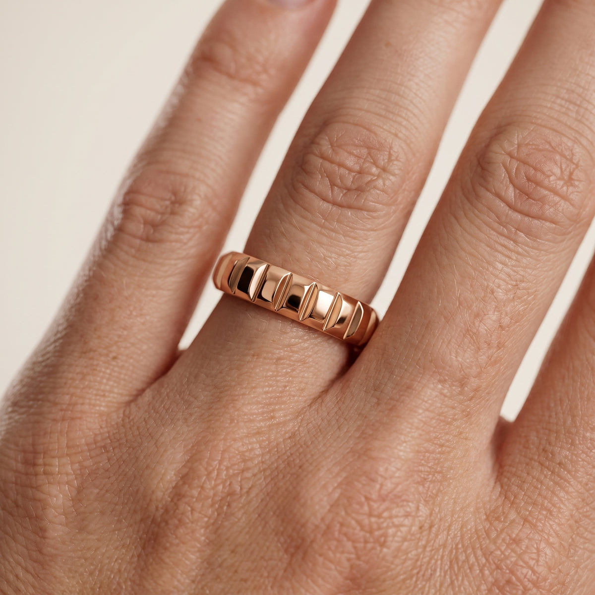 Laurel Grooved Low Dome Wedding Band in Rose Gold - lifestyle.jpg
