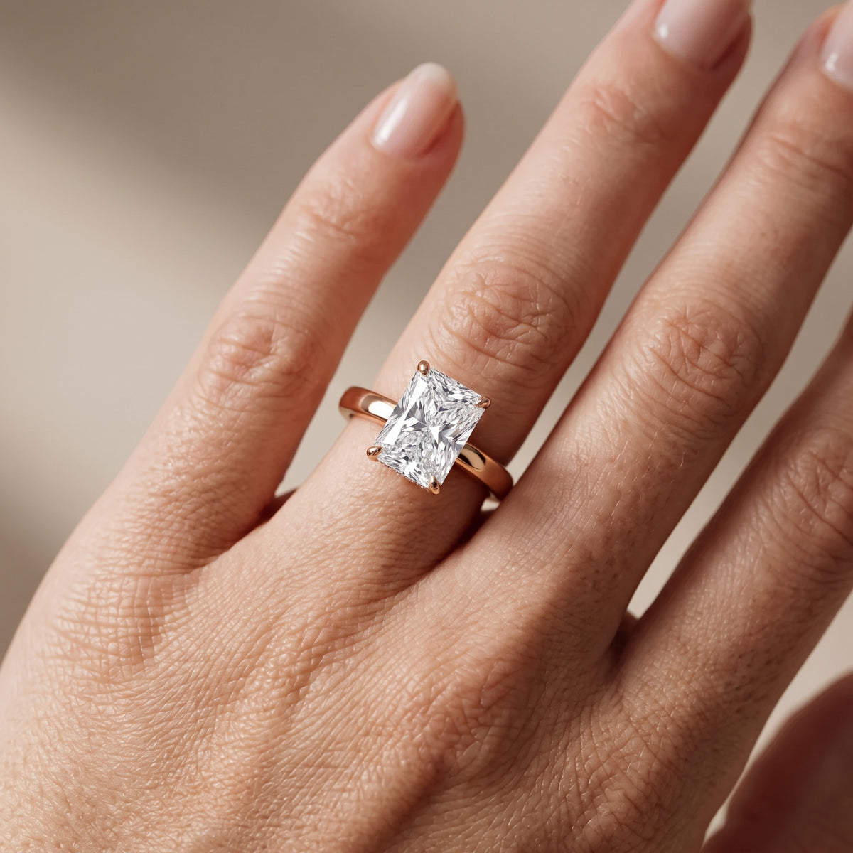 Lara Hidden Halo Radiant Diamond Engagement Ring in Rose Gold - lifestyle.jpg
