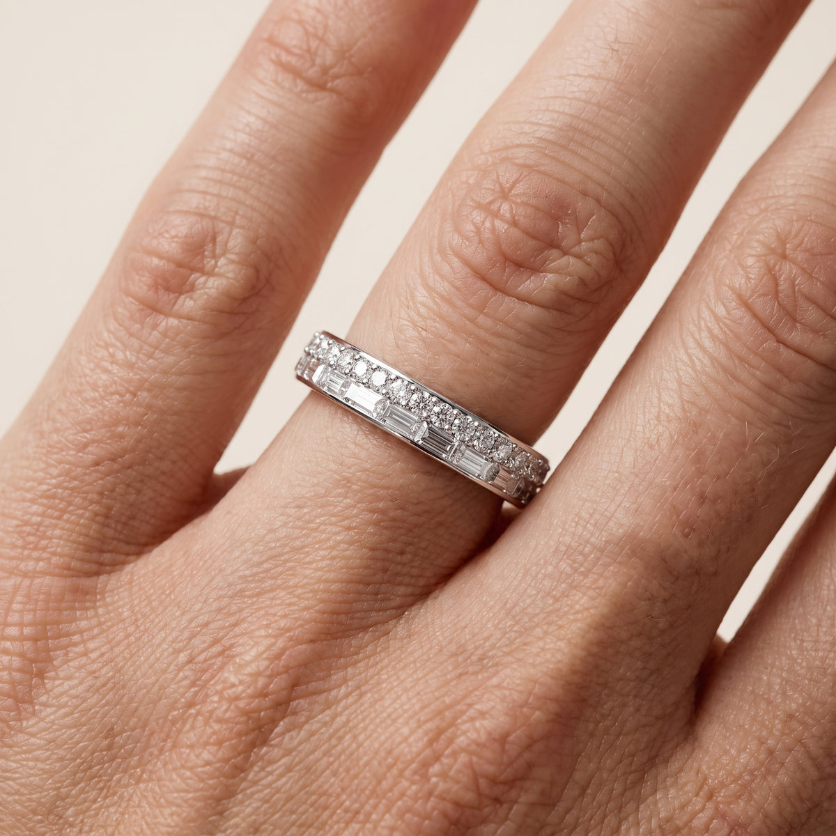 Genevieve Channel Set Round & Baguette Diamond Anniversary Ring in Platinum - lifestyle.jpg