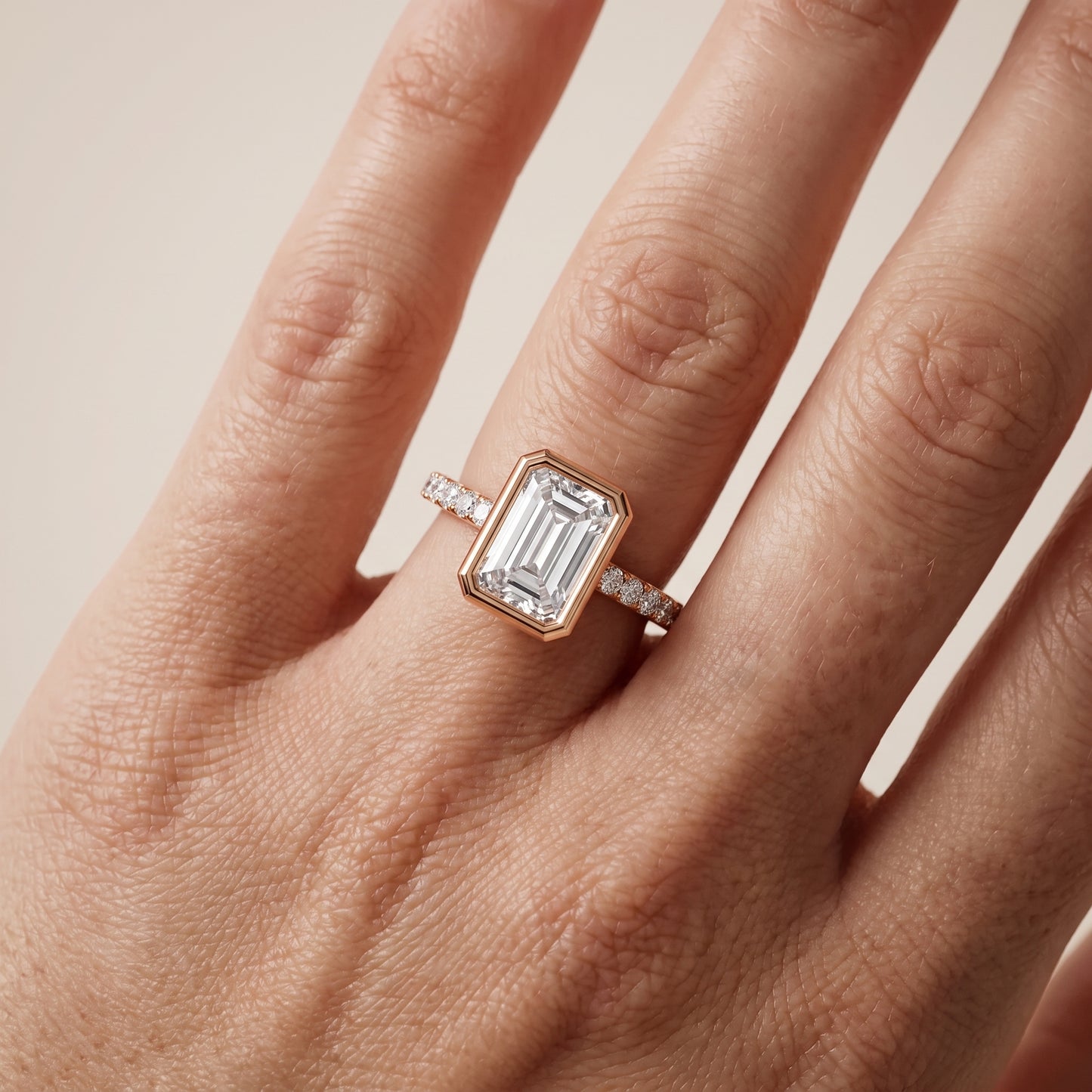 Cora Bezel Pavé Emerald Diamond Ring in Rose Gold - lifestyle.jpg