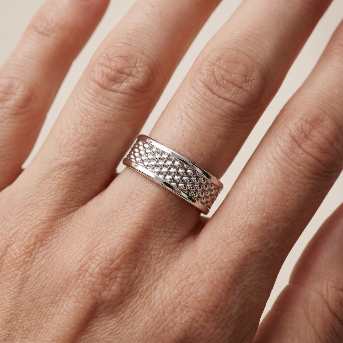 Cordelia Carved Step Edge Wedding Band in Silver - lifestyle.jpg