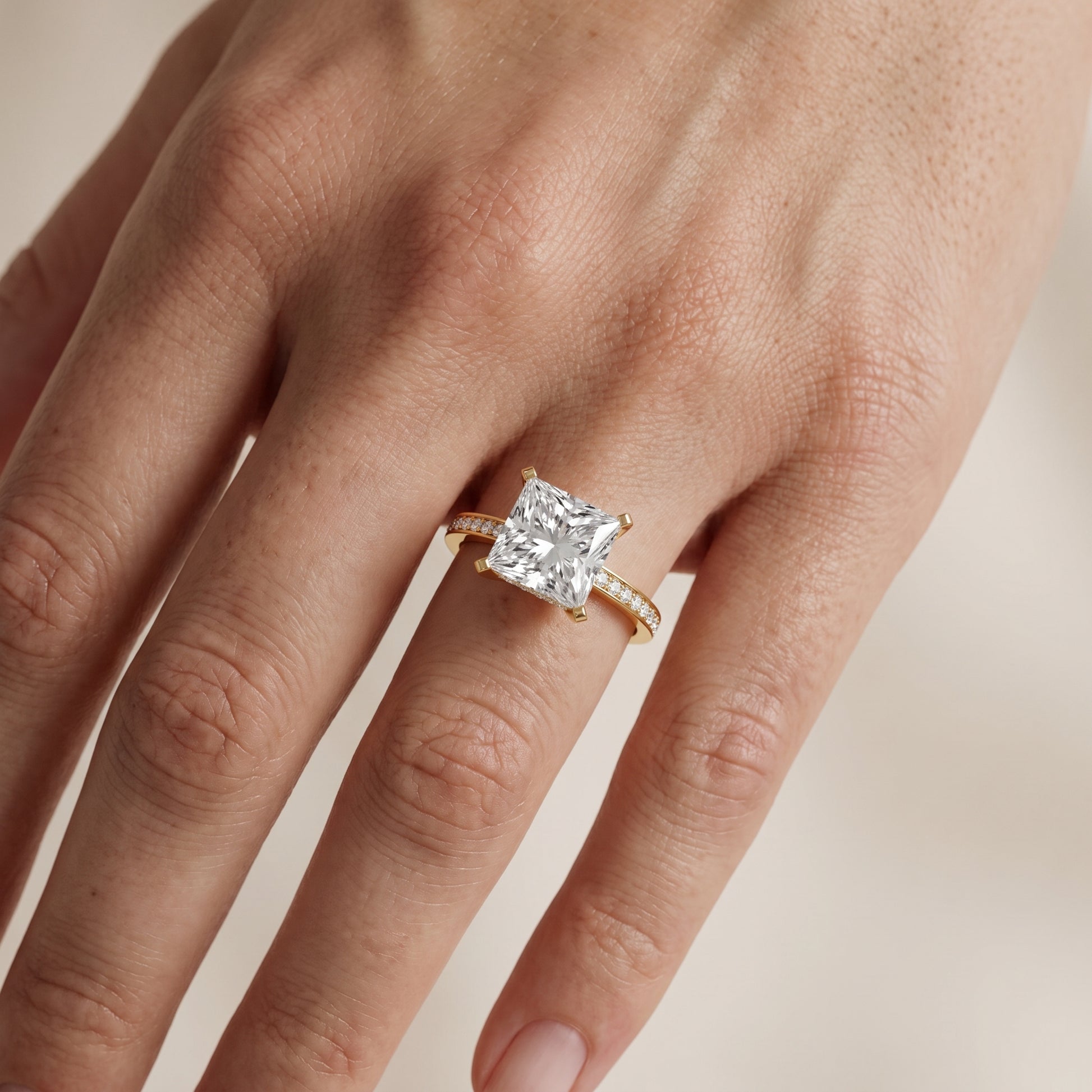 Naia Hidden Halo Princess Diamond Ring in Yellow Gold - lifestyle.jpg
