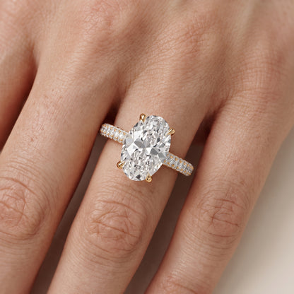 Della Hidden Halo Pavé Oval Diamond Engagement Ring in Yellow Gold - lifestyle.jpg