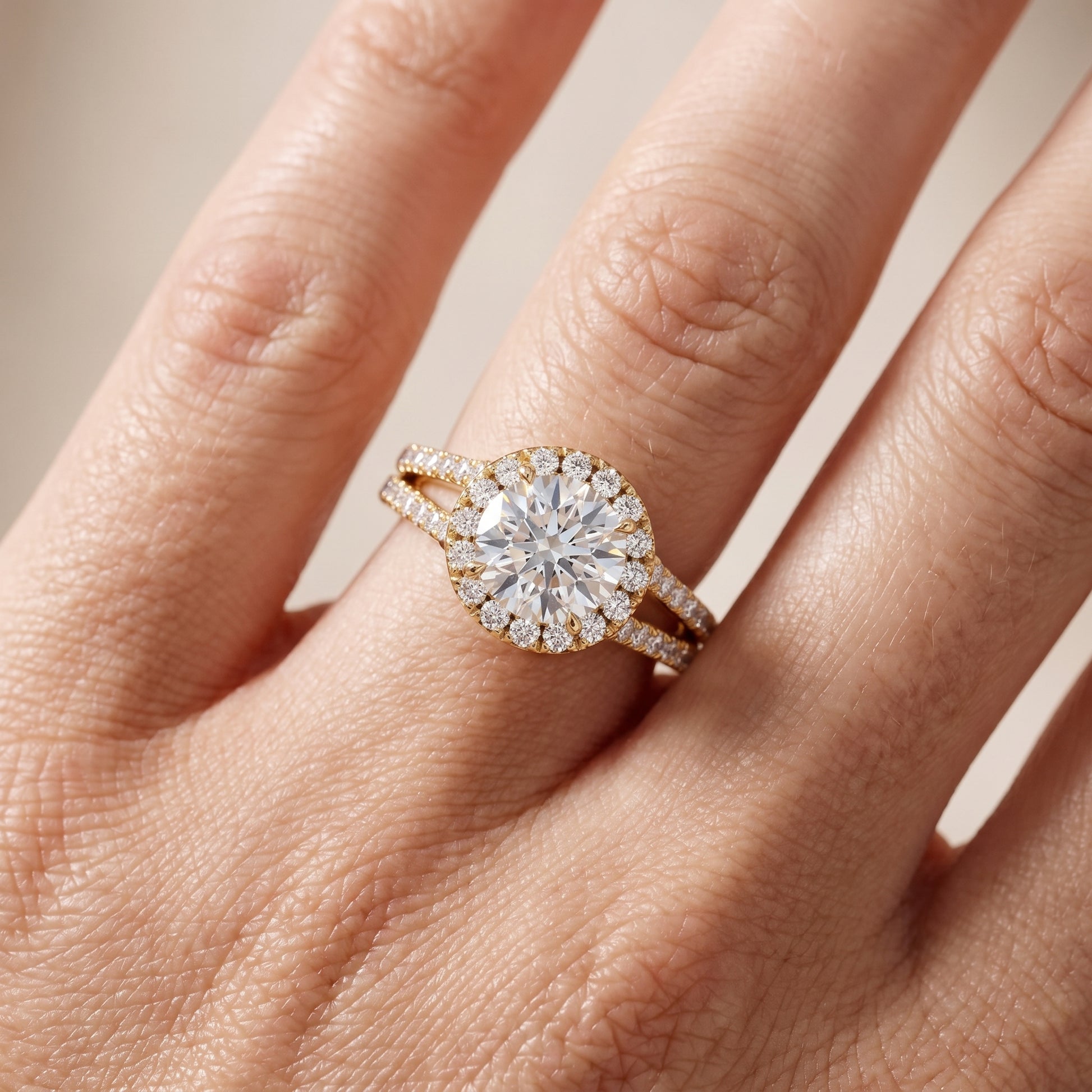 Kira Halo Split Shank Round Diamond Engagement Ring in Yellow Gold - lifestyle.jpg