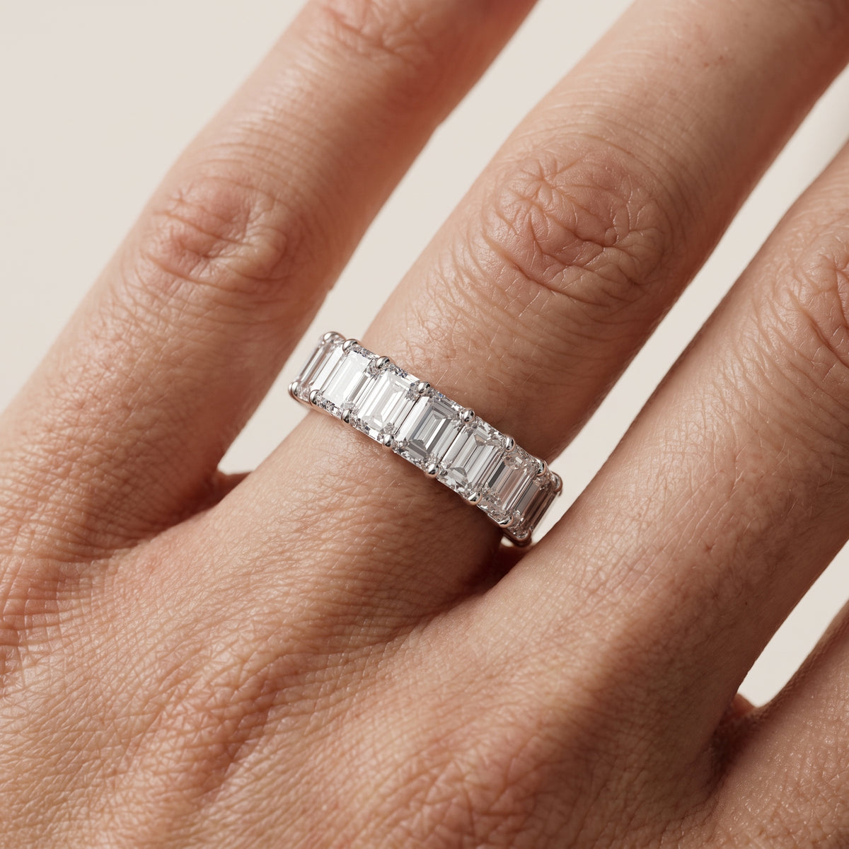 Zaya Shared Prong Emerald Diamond Eternity Band in White Gold - lifestyle.jpg