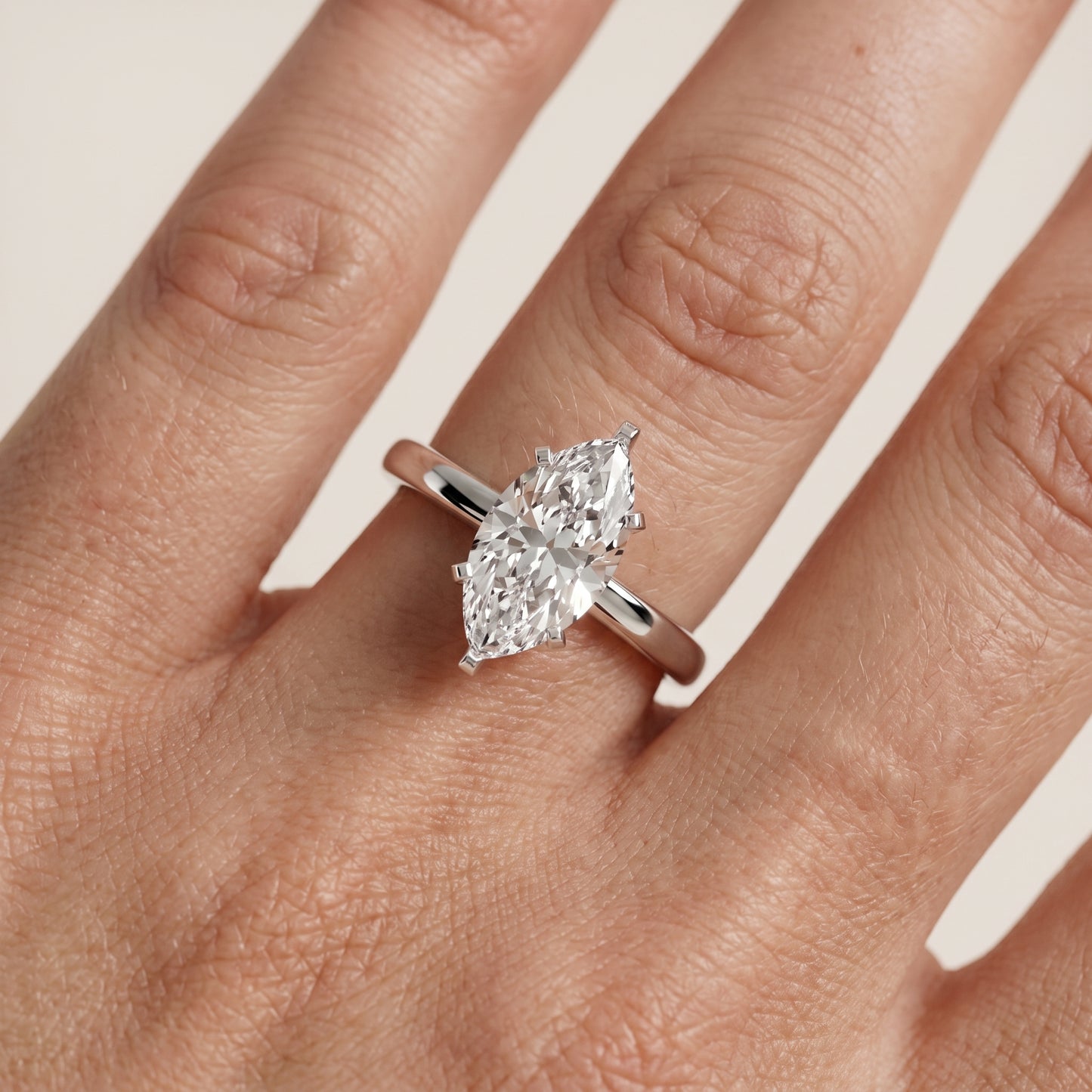 Liana Solitaire Claw Prong Marquise Diamond Engagement Ring in Platinum - lifestyle.jpg