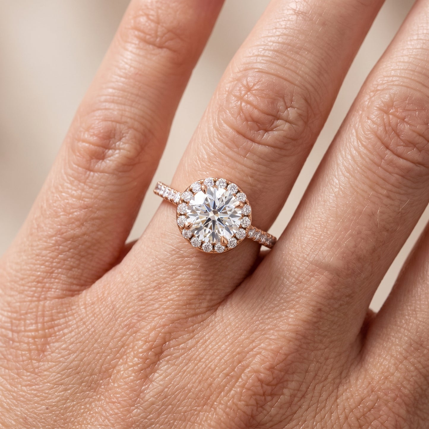 Amara Halo Claw Prong Round Diamond Ring in Rose Gold - lifestyle.jpg