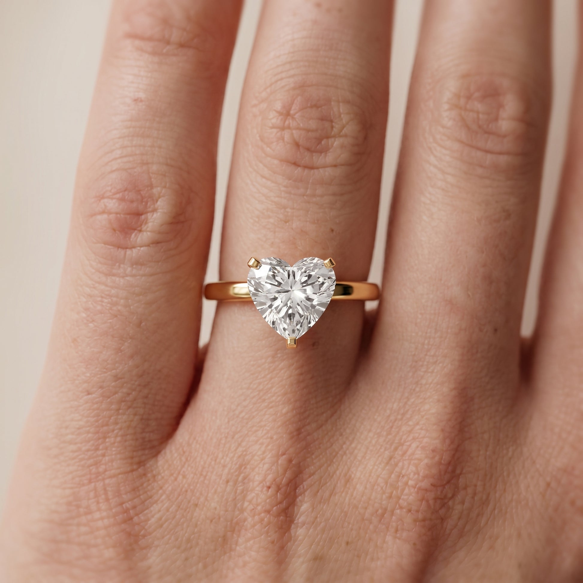 Liana Solitaire Claw Prong Heart Diamond Engagement Ring in Yellow Gold - lifestyle.jpg