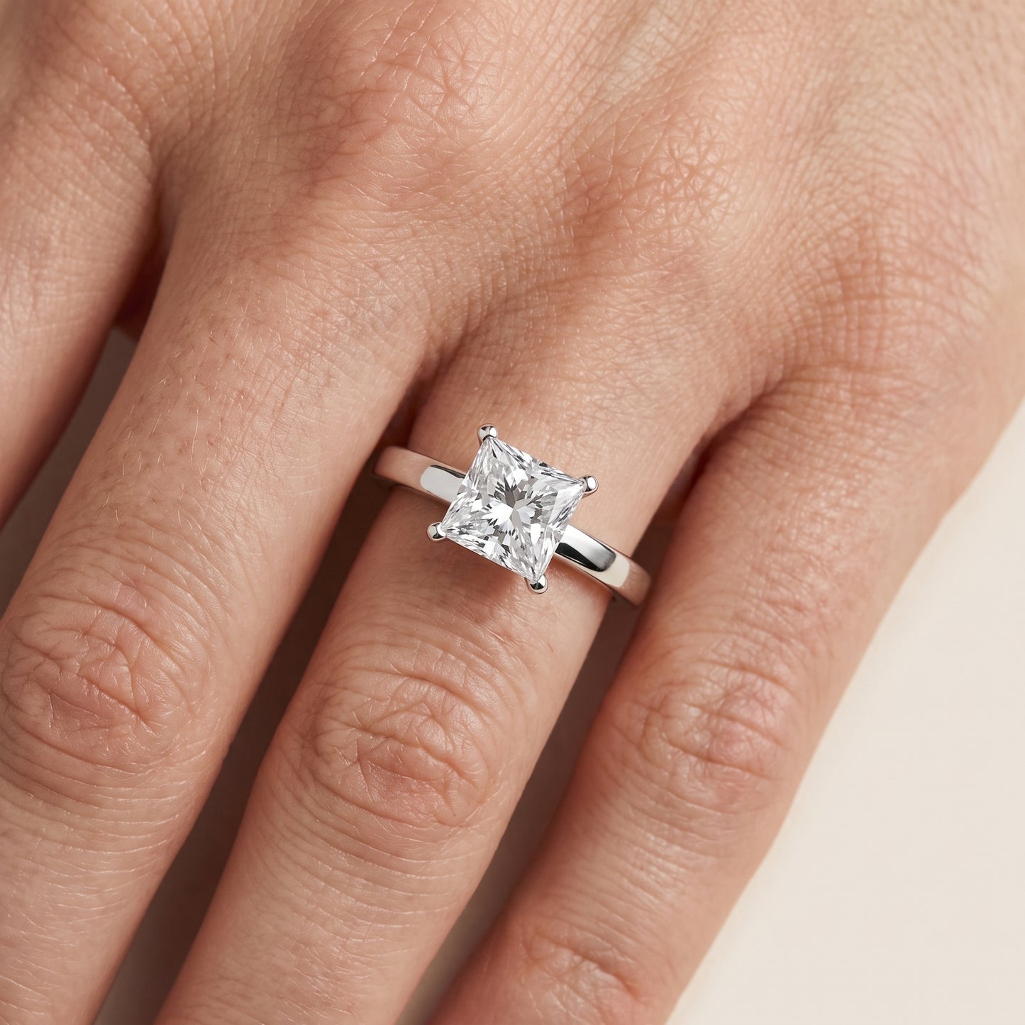 Delia Solitaire Princess Diamond Engagement Ring in Silver - lifestyle.jpg