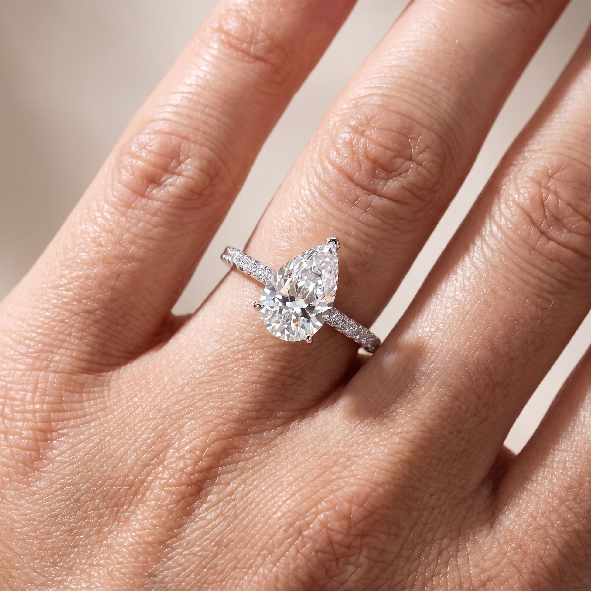 Violet Hidden Halo Pavé Pear Diamond Ring in Silver - lifestyle.jpg