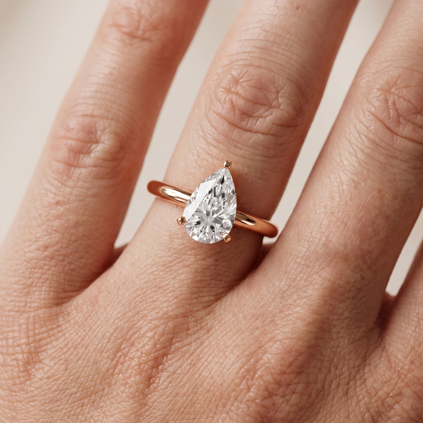 Wren Solitaire Pear Diamond Ring in Rose Gold - lifestyle.jpg