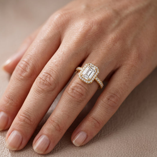 Rosemary Halo Pavé Emerald Diamond Engagement Ring in Yellow Gold - lifestyle.jpg