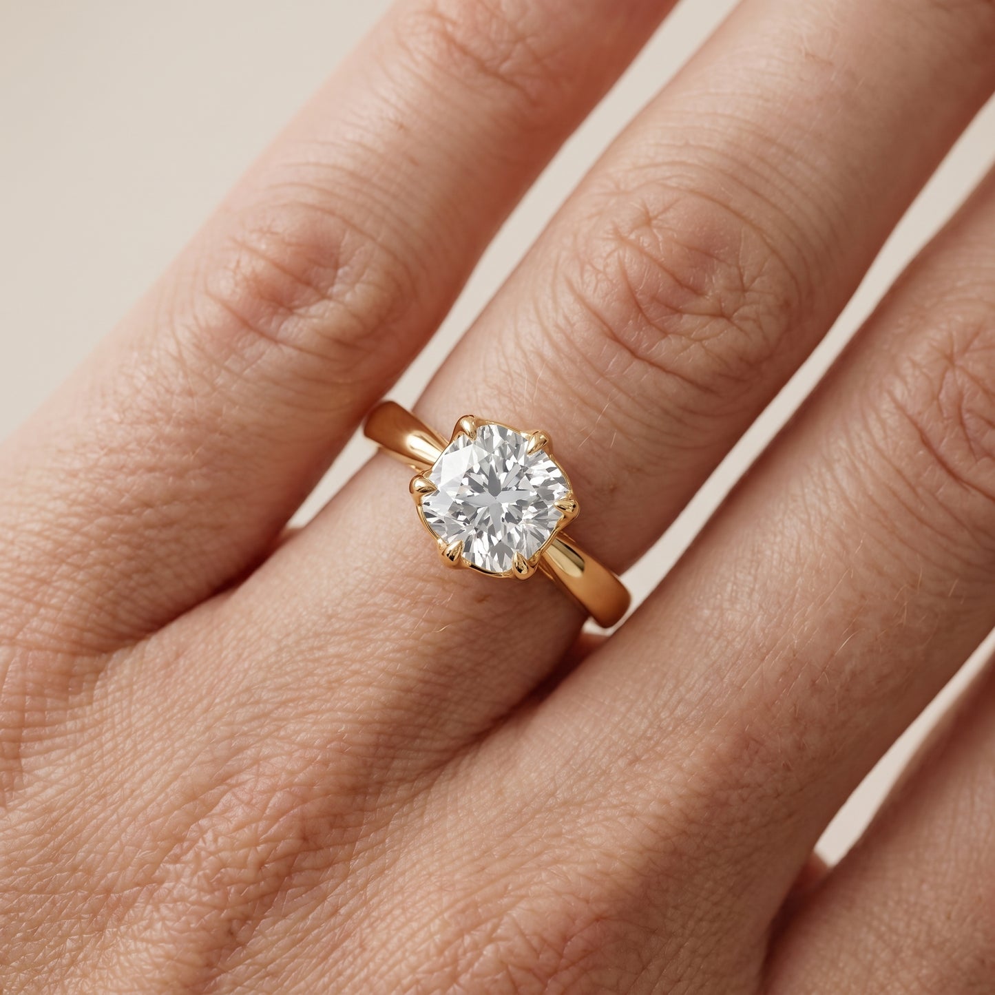 Lucia Solitaire Six-Prong Cushion Diamond Engagement Ring in Yellow Gold - lifestyle.jpg