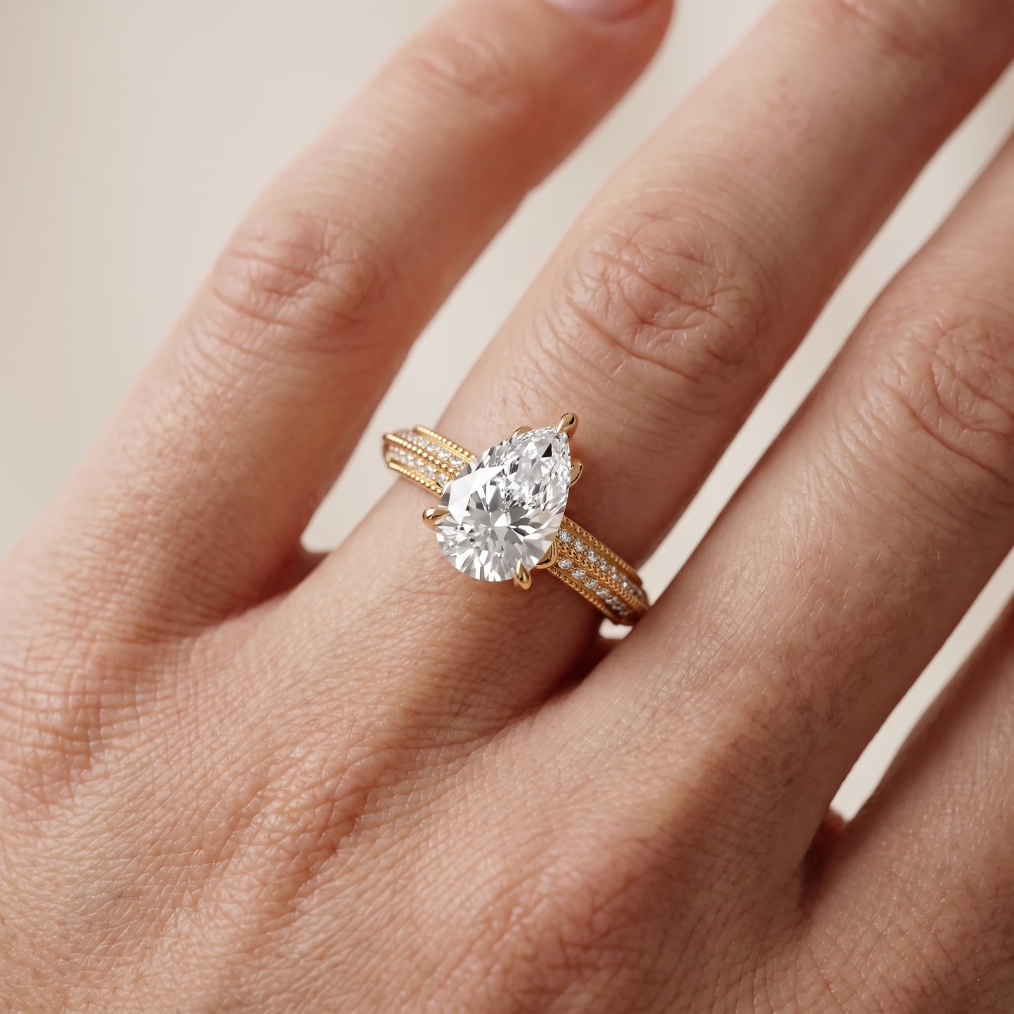 Indie Vintage Milgrain Pear Diamond Engagement Ring in Yellow Gold - lifestyle.jpg
