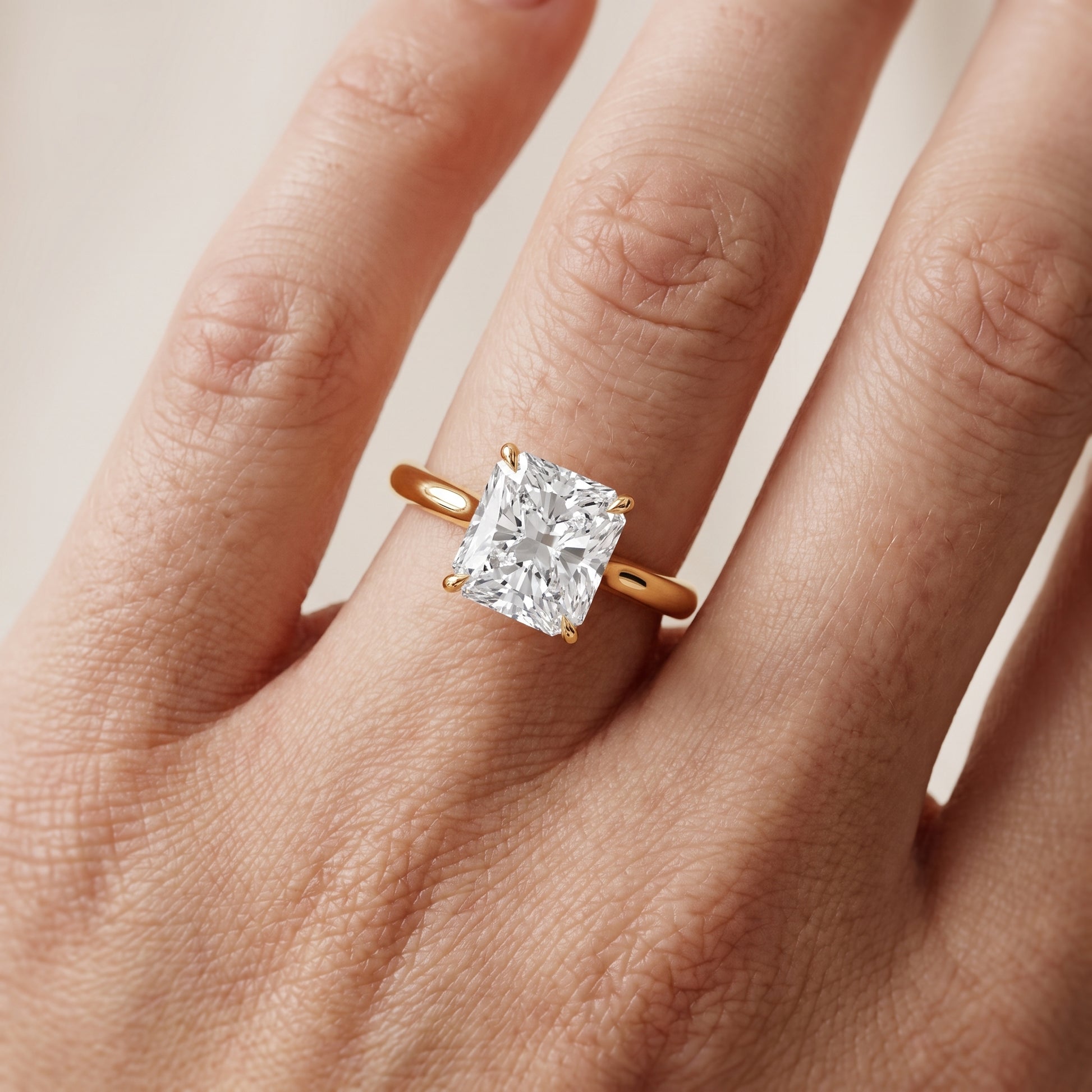Evie Solitaire Six-Prong Radiant Diamond Engagement Ring in Yellow Gold - lifestyle.jpg
