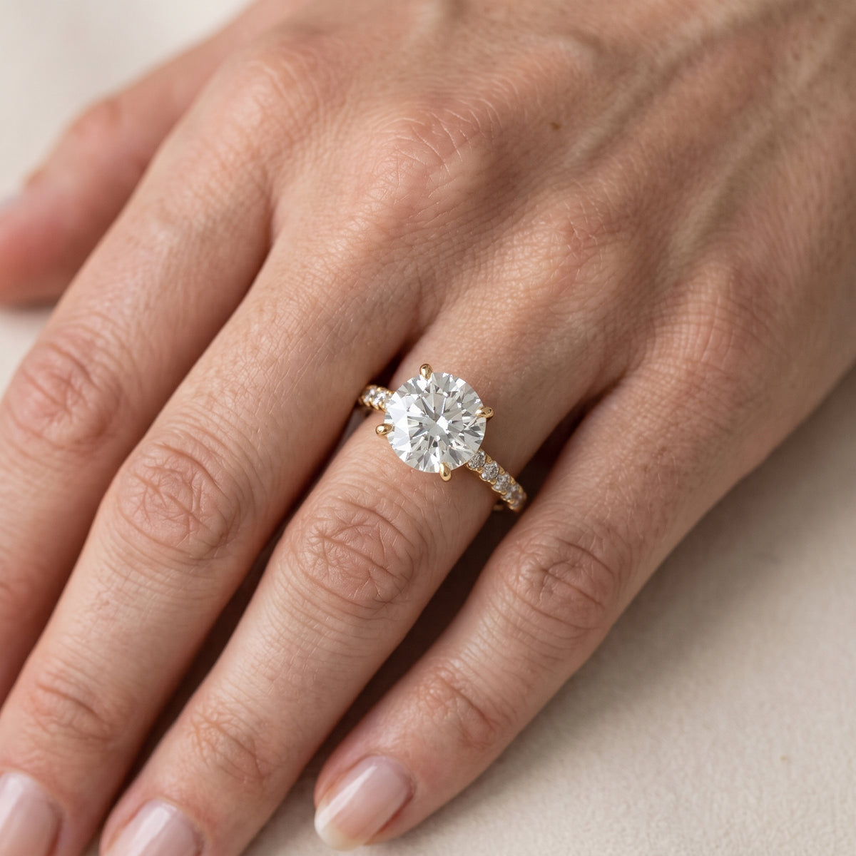 Octavia Cathedral Pavé Round Diamond Engagement Ring in Rose Gold - lifestyle.jpg