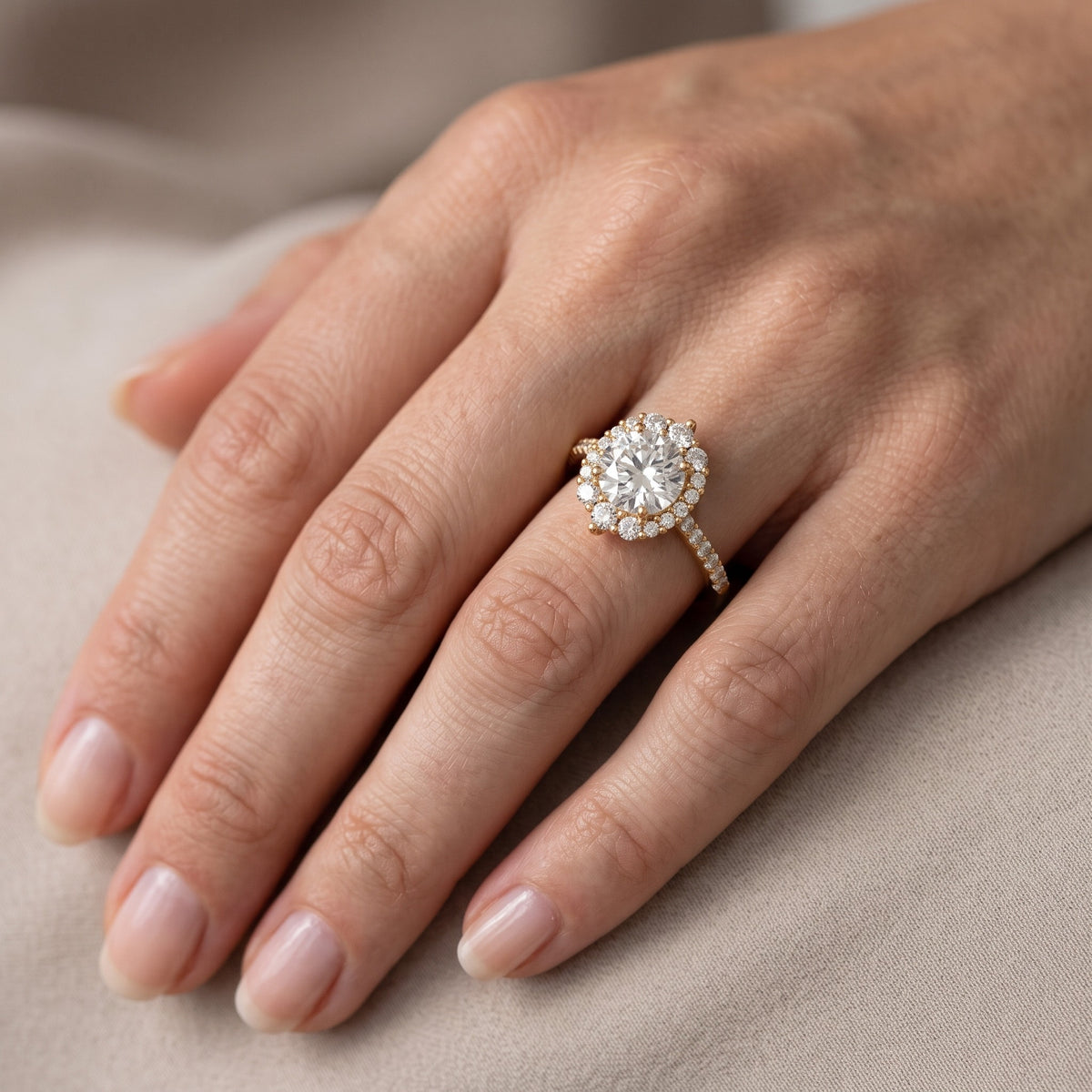 Rowena Graduated Halo Round Diamond Engagement Ring in Platinum - lifestyle.jpg