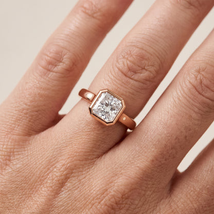 Jolie Bezel Solitaire Radiant Diamond Engagement Ring in Rose Gold - lifestyle.jpg