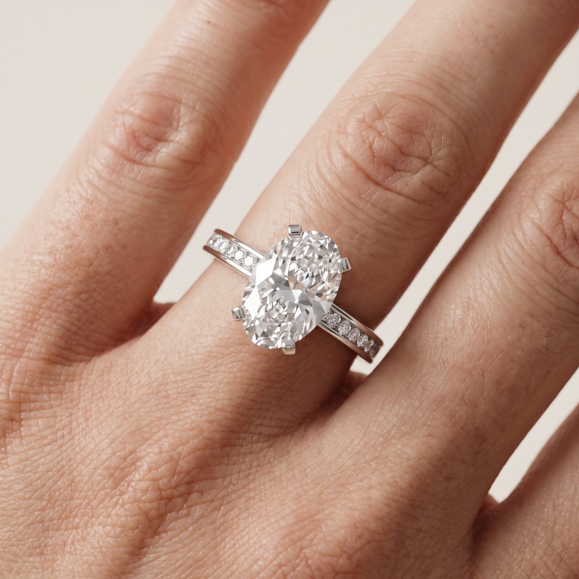 Tessa Solitaire Channel Set Oval Diamond Engagement Ring in White Gold - lifestyle.jpg