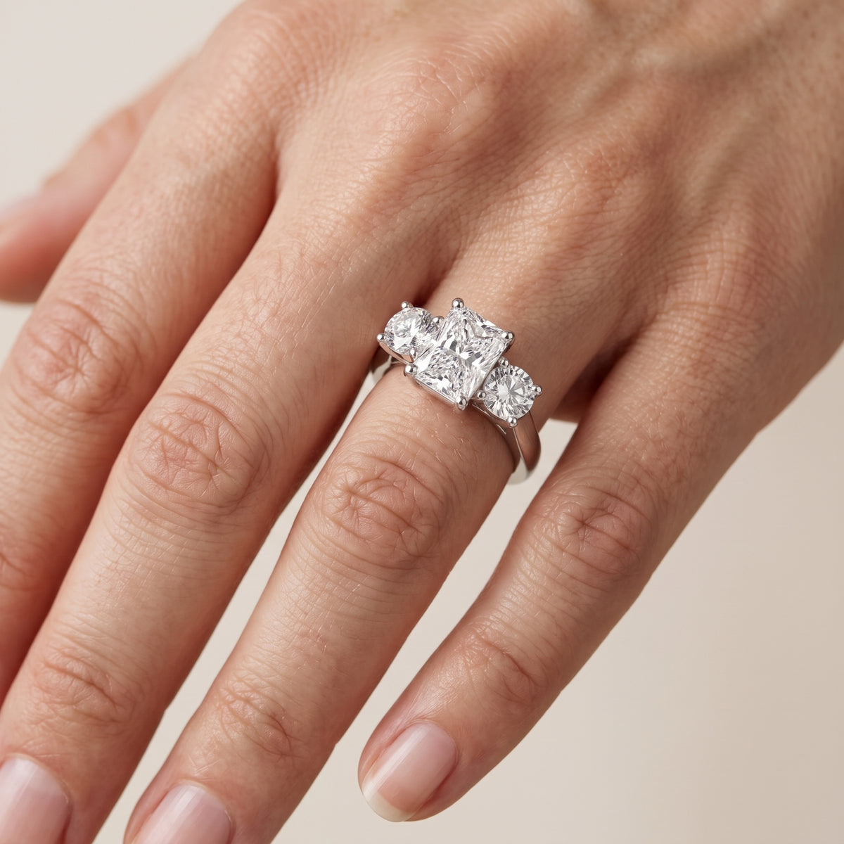 Callie Three-Stone Trellis Radiant Diamond Engagement Ring in Platinum - lifestyle.jpg