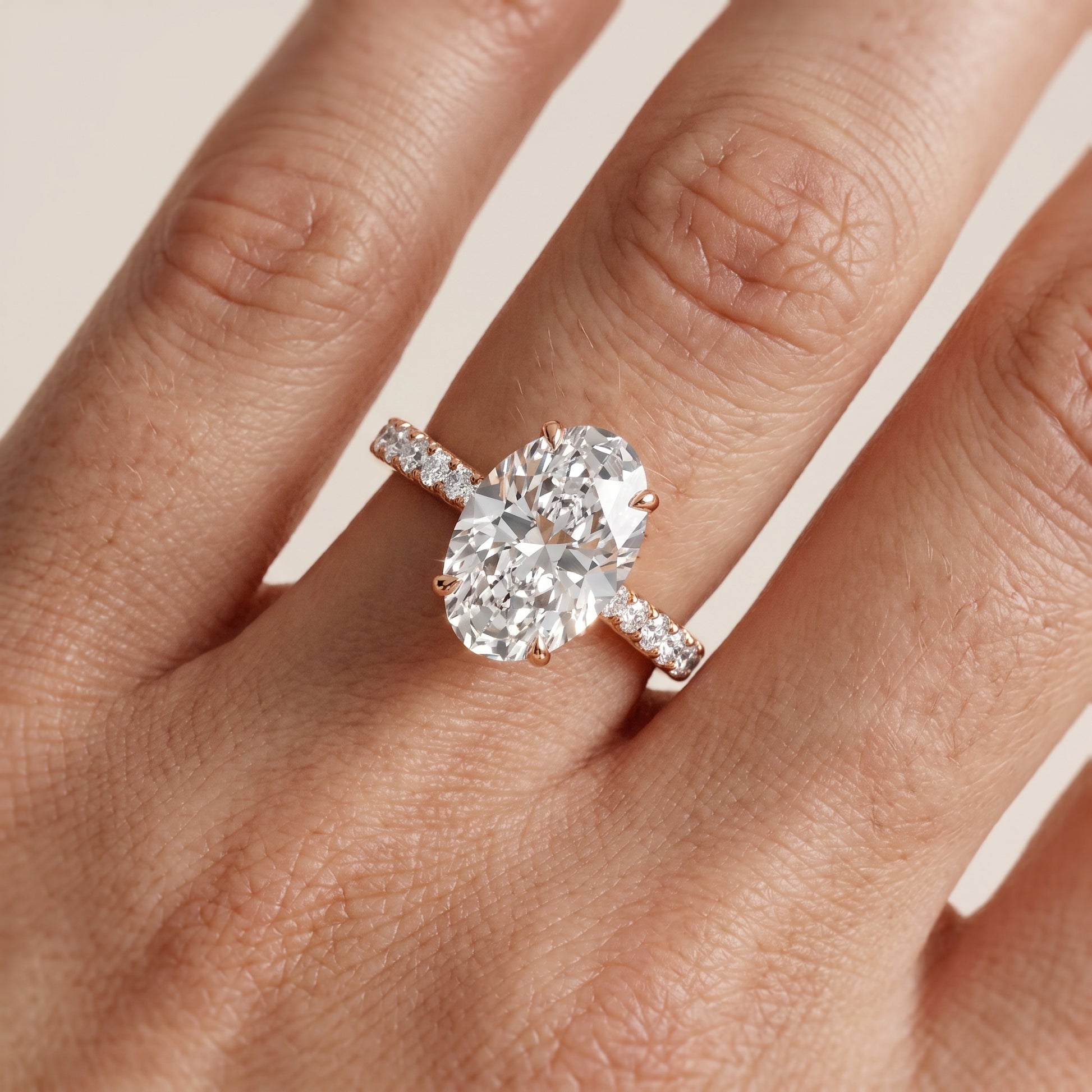 Gia Hidden Halo Pavé Oval Diamond Ring in Rose Gold - lifestyle.jpg