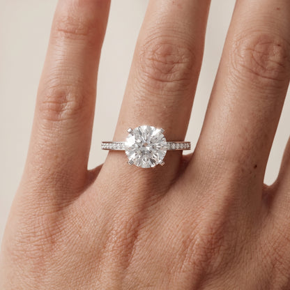 Naia Hidden Halo Round Diamond Ring in Platinum - lifestyle.jpg