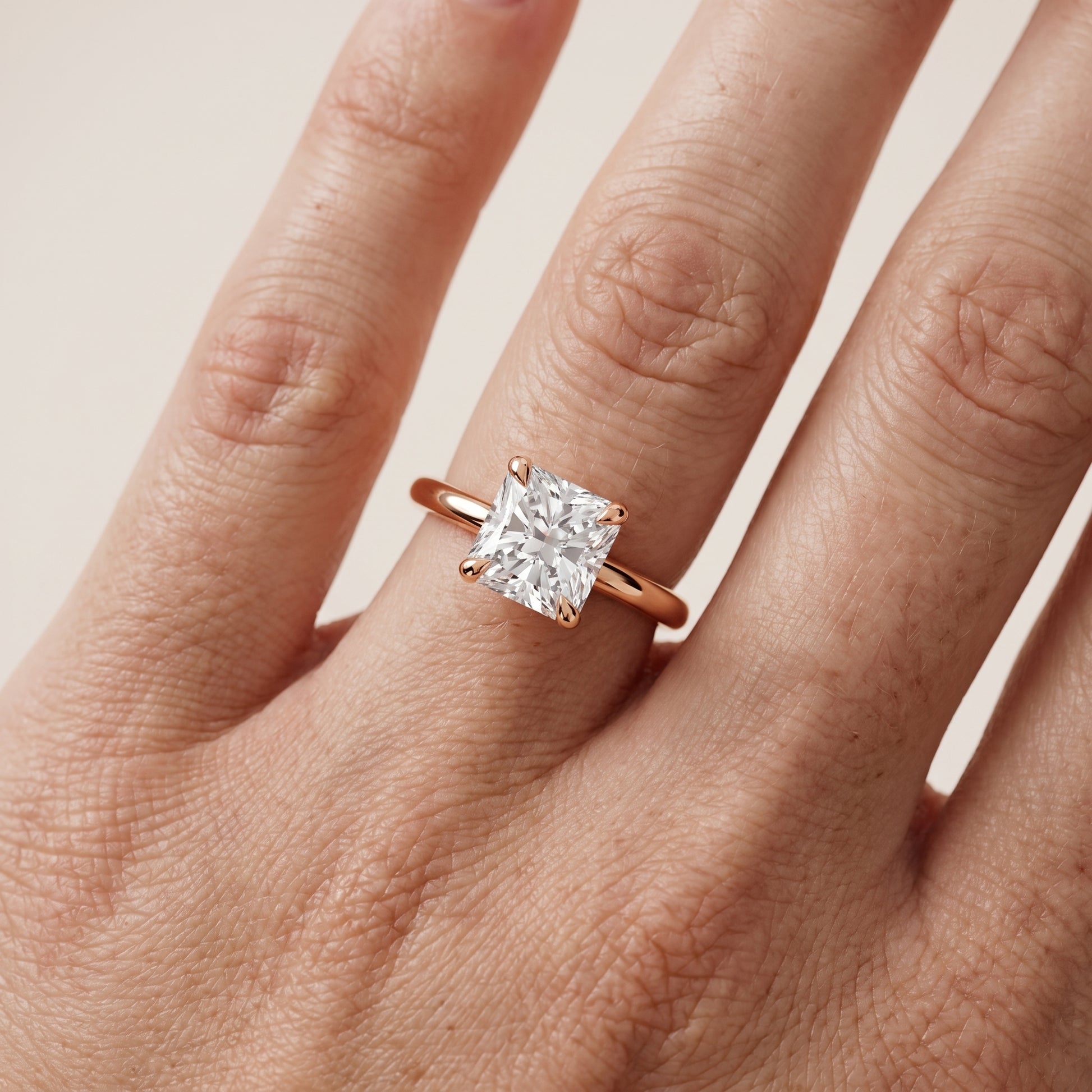 Nella Petite Solitaire Radiant Diamond Engagement Ring in Rose Gold - lifestyle.jpg