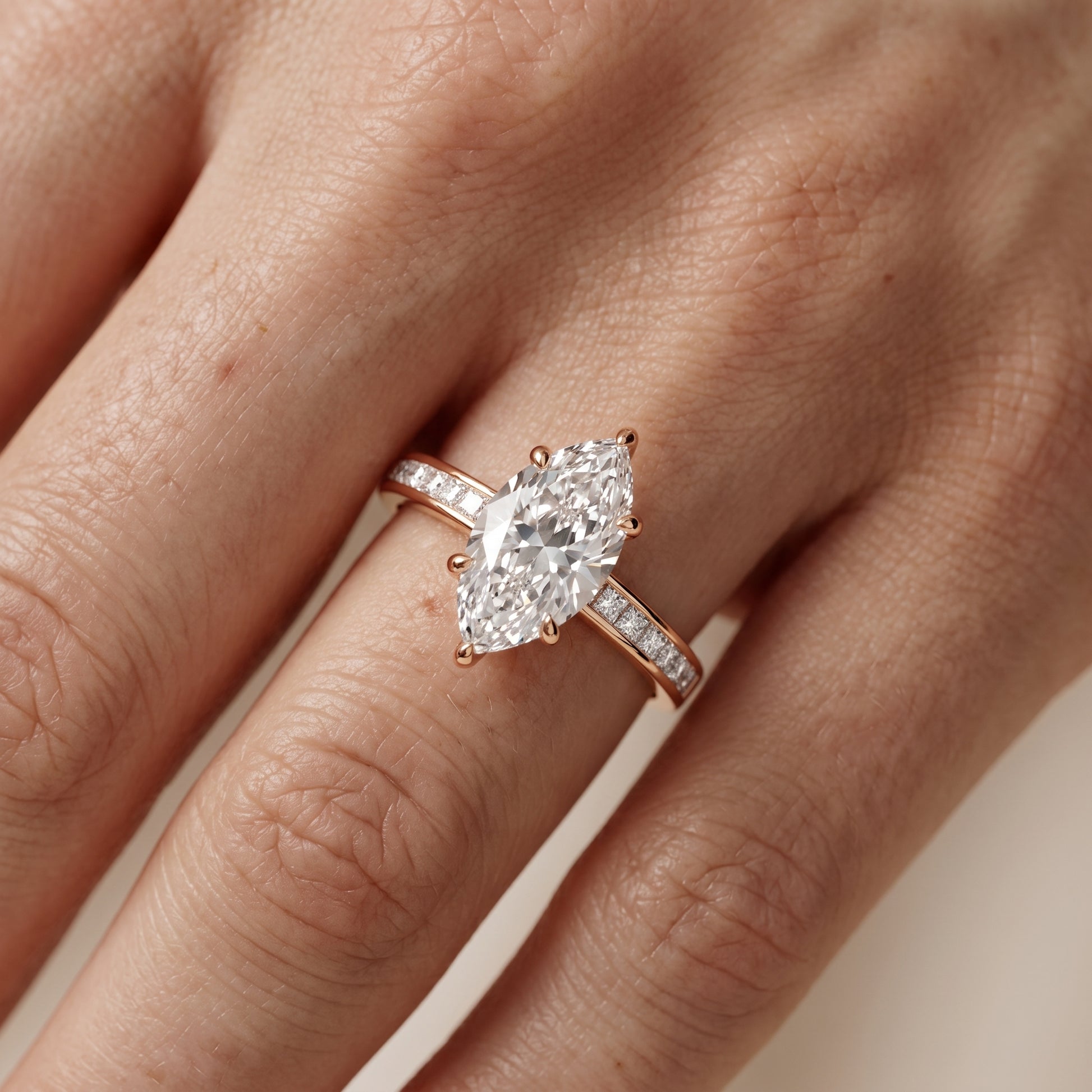 Maren Sidestone Channel Set Marquise Diamond Engagement Ring in Rose Gold - lifestyle.jpg