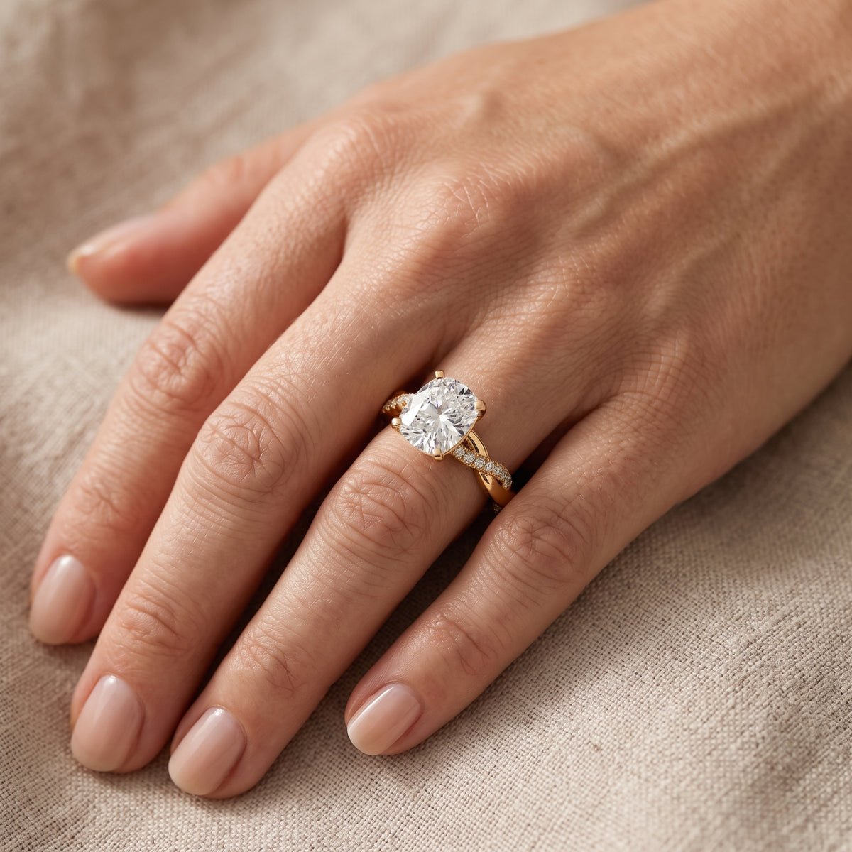 Twisted Side Stone Cushion Diamond Engagement Ring in Yellow Gold - lifestyle.jpg