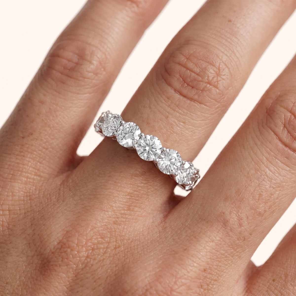 Malia Shared Prong Round & Emerald Diamond Eternity Band in White Gold - lifestyle.jpg