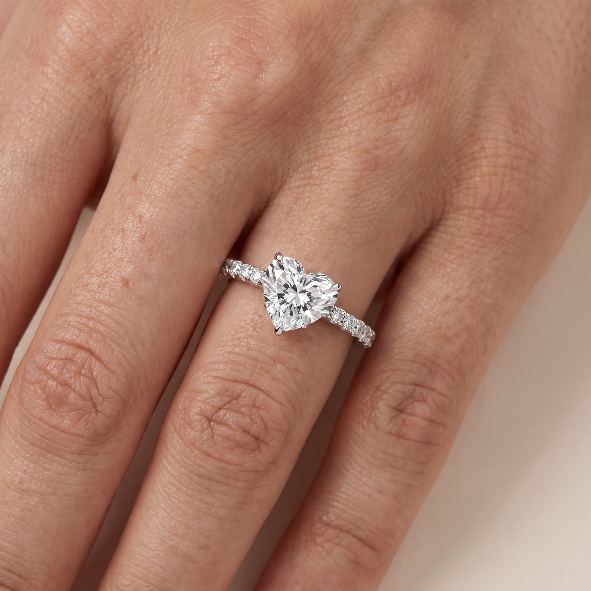 Gia Hidden Halo Pavé Heart Diamond Ring in Platinum - lifestyle.jpg
