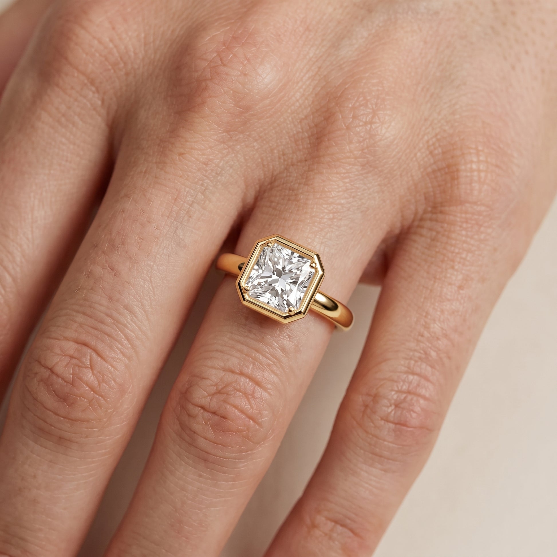 Alina Bezel Solitaire Radiant Diamond Ring in Yellow Gold - lifestyle.jpg