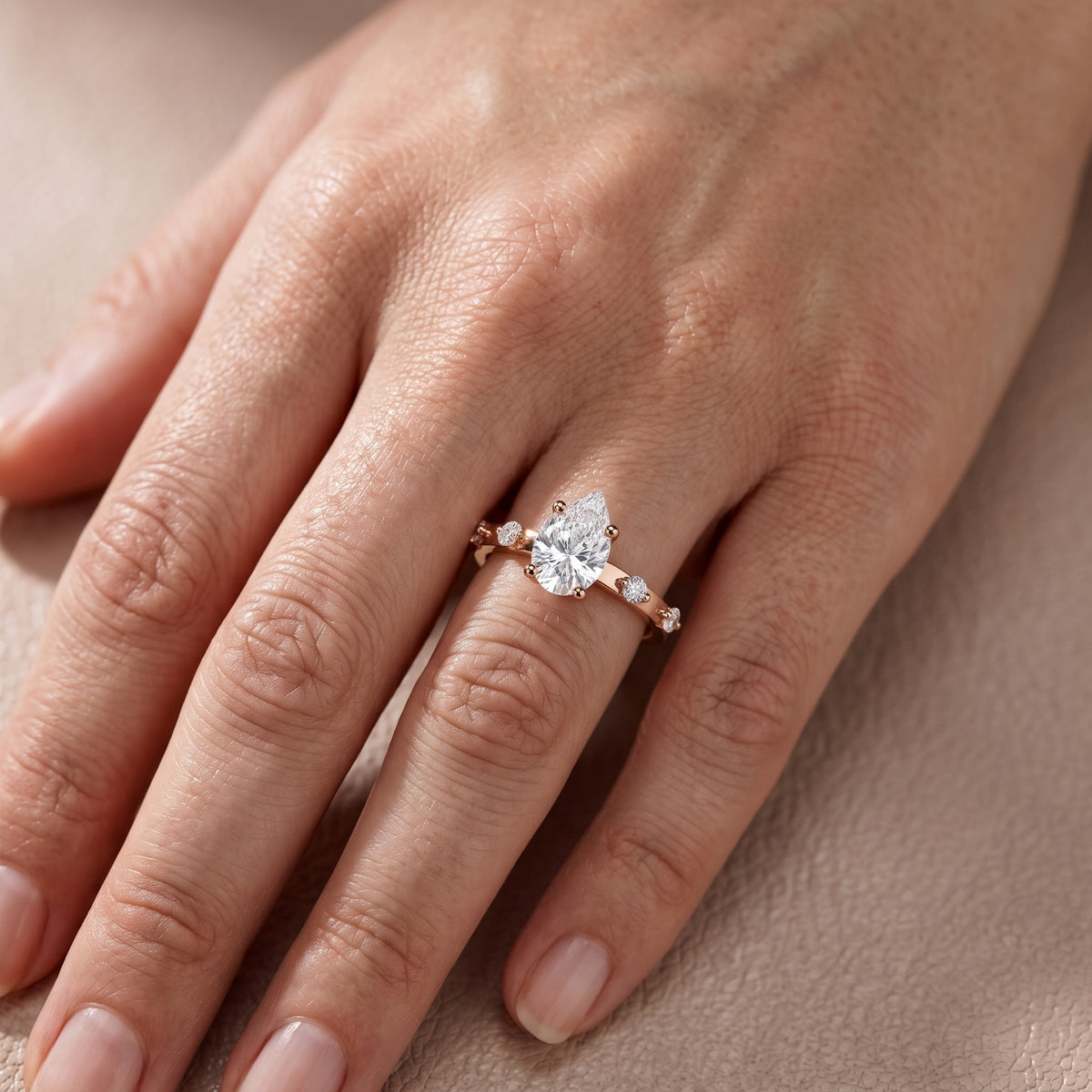 Elena Radiance Solitaire Pear Diamond Engagement Ring in Rose Gold - lifestyle.jpg