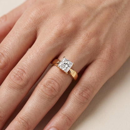 Talia Solitaire Twist Princess Diamond Engagement Ring in Yellow Gold - lifestyle.jpg